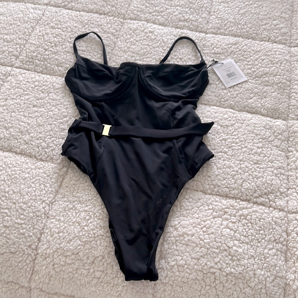 Never worn brand new tags still on black bathing suit with under wire belt